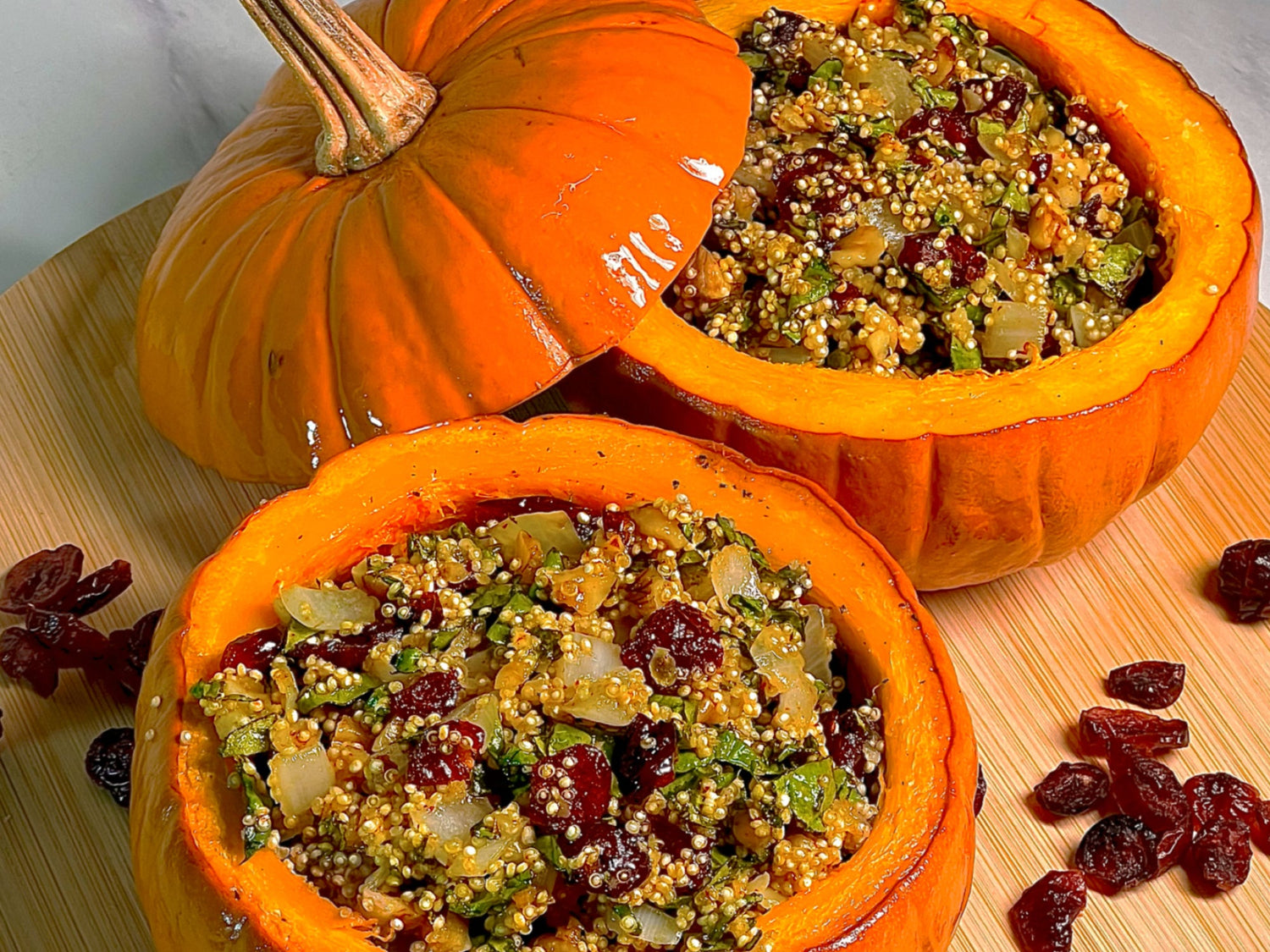 Quinoa-Stuffed Pumpkin with Walnuts and Cranberries